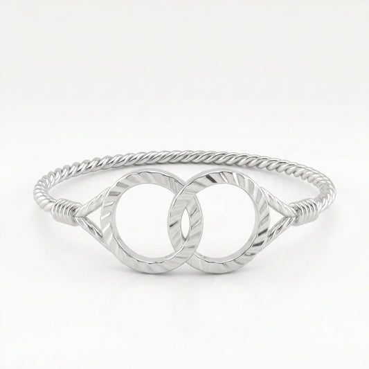 Broad Twin Circle Twisted Bangle